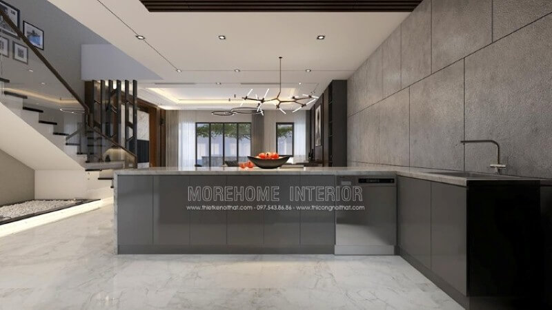 Trang trí nội thất hiện đại đẹp, độc đáo với gam màu ghi nổi bật trong toàn không gian bếp từ bộ tủ bếp đảo gỗ acrylic sáng bóng được phủ bề mặt đá ốp sang trọng, gạch ốp tường giả bê tông. Mẫu tủ bếp biệt thự acrylic