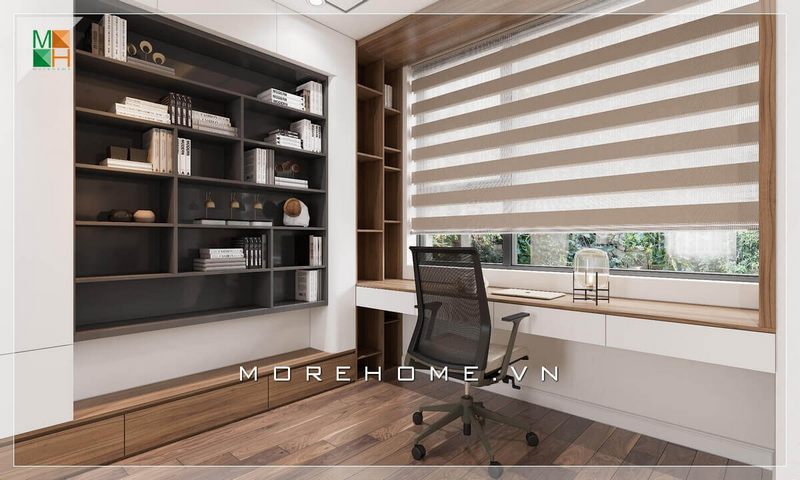 Mẫu bàn làm việc liền kệ giá sách hiện đại cạnh ngay cửa sổ lớn, không gian làm việc trở nên thông thoáng và đầy năng lượng.